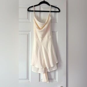 CREAM ALTAR’D STATE WRAP ROMPER